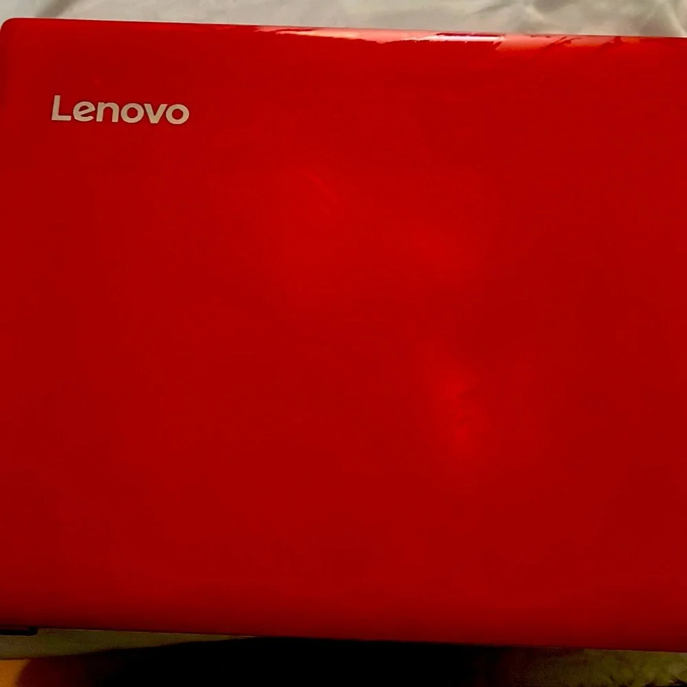 Lenovo computer still works perfectly comes with the charger and a computer bag